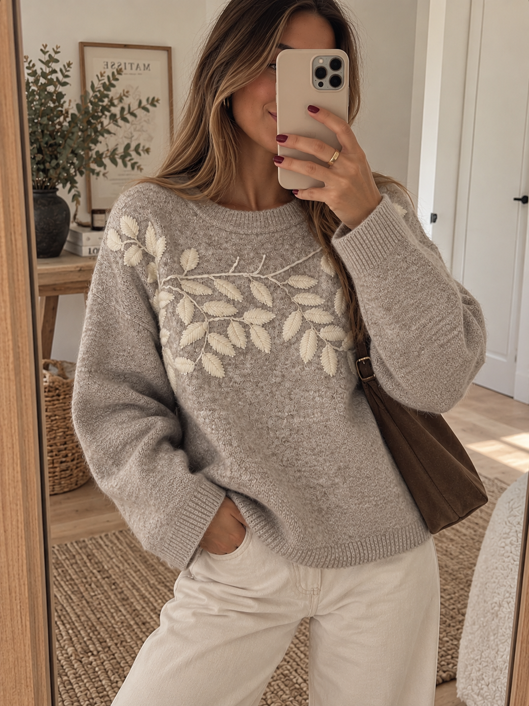 Jersey con detalles de hojas